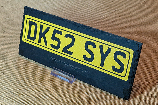 Engraved and painted decorative number plate